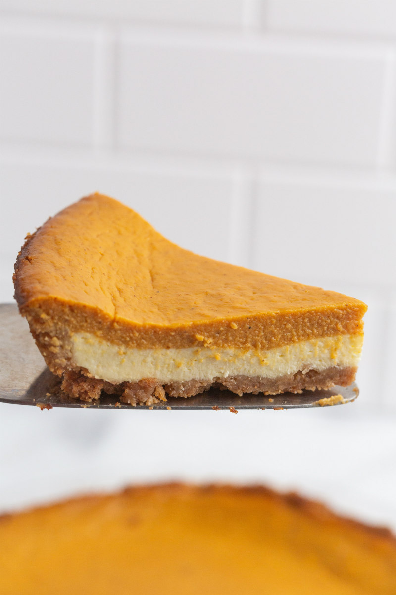 slice of pumpkin cream cheese pie