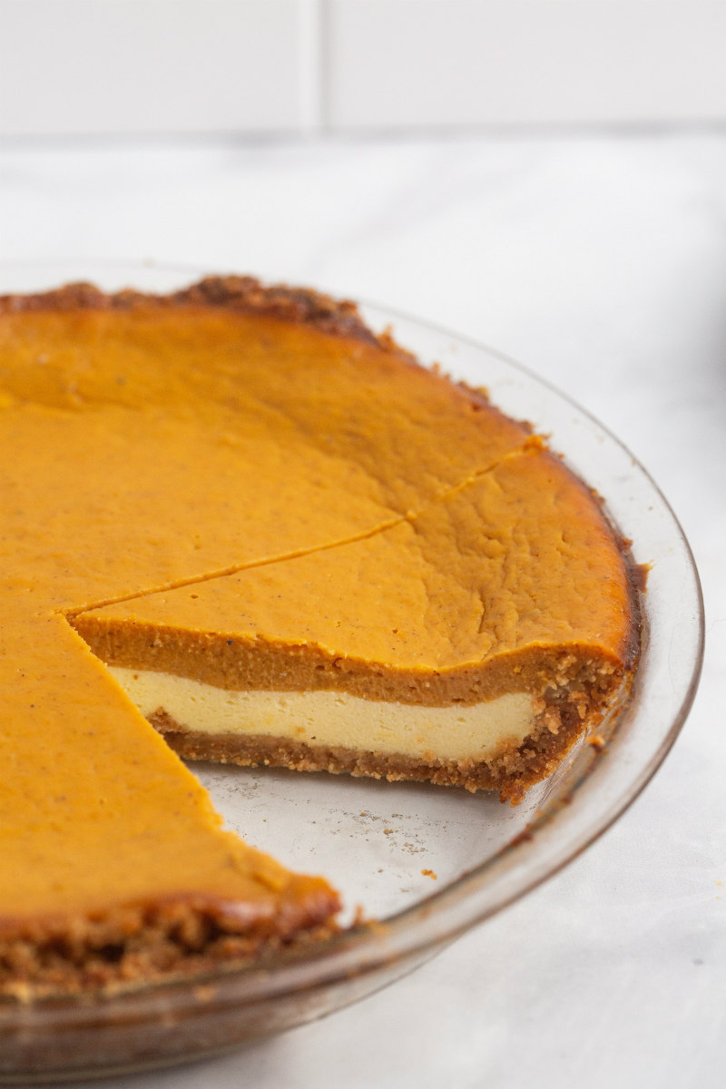 pumpkin cream cheese pie sliced into