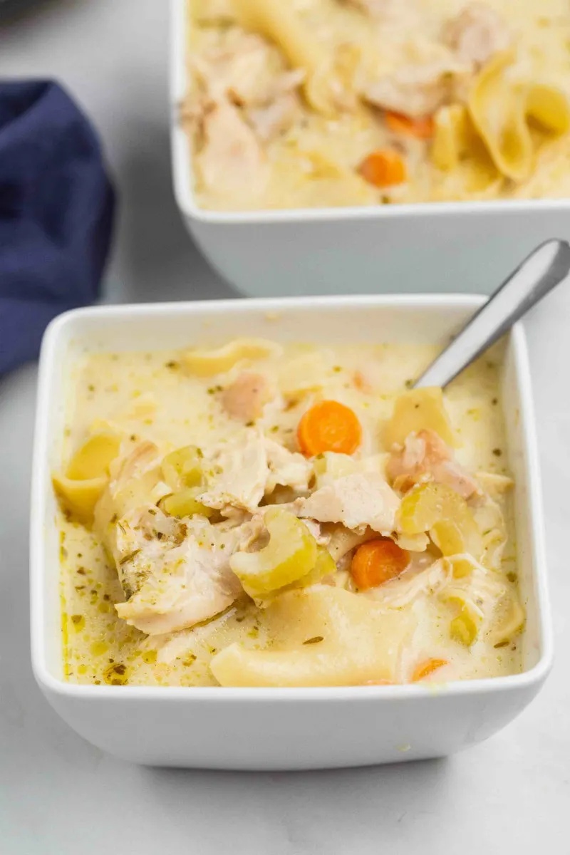 turkey soup in a bowl with a spoon