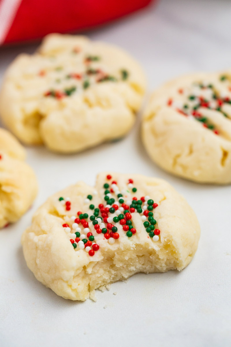 christmas shortbread cookies- one with a bite out of it
