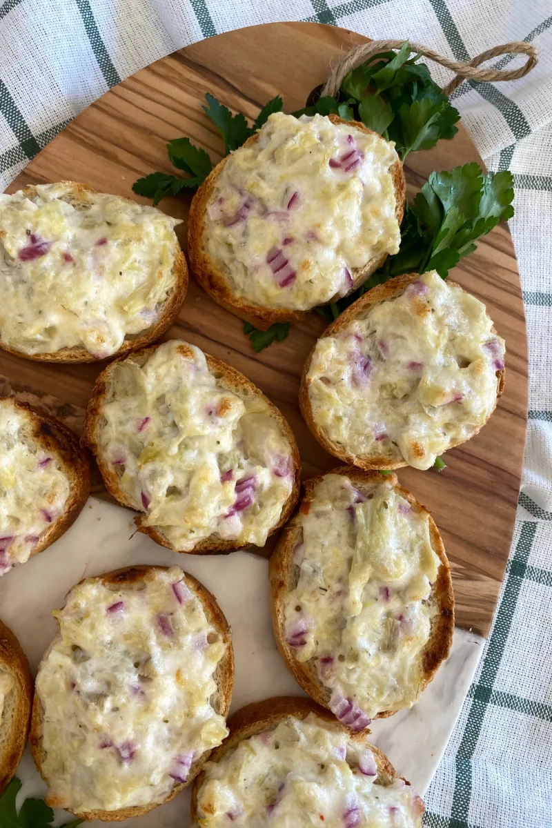 artichoke bruschetta on a board