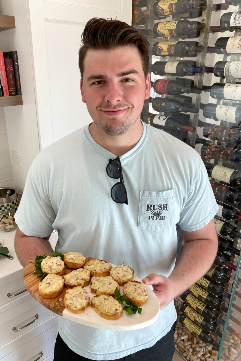 recipeboy holding tray of appetizers