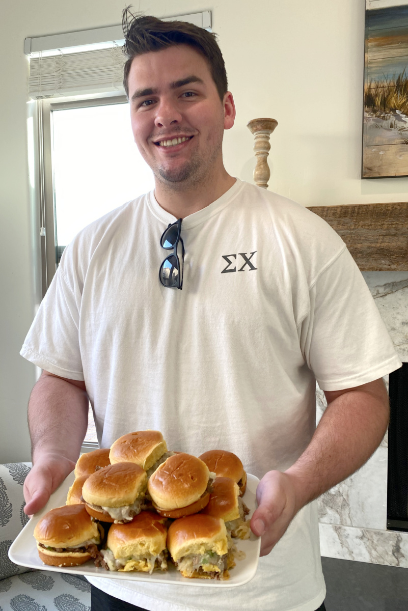 RecipeBoy holding tray of sliders