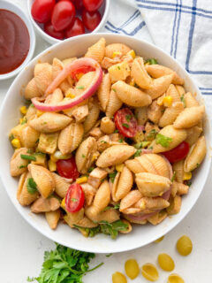 white bowl of BBQ chicken pasta salad