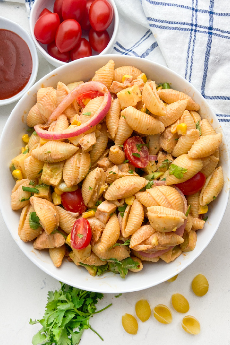 white bowl of BBQ chicken pasta salad