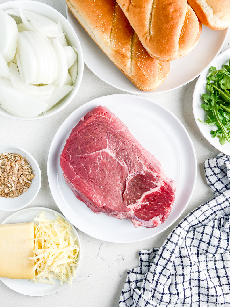 ingredients displayed for making french onion steak sandwiches