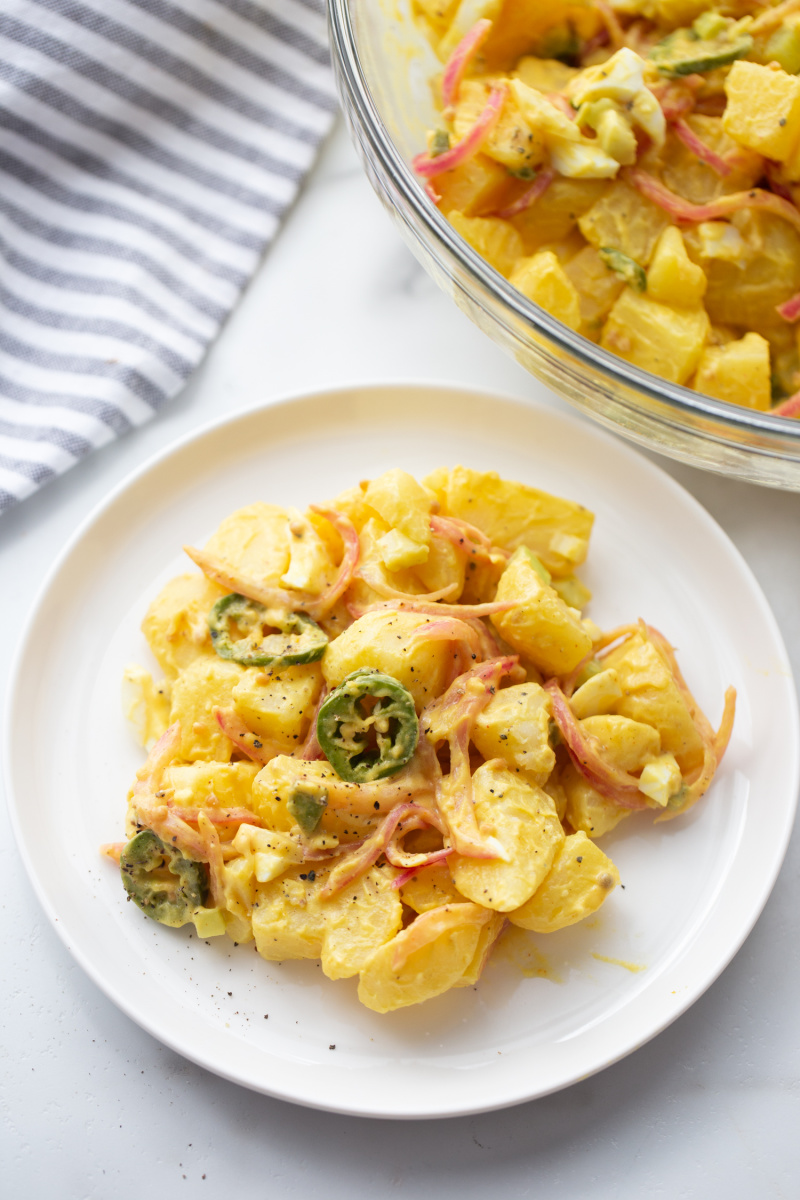 serving of texas potato salad on white plate