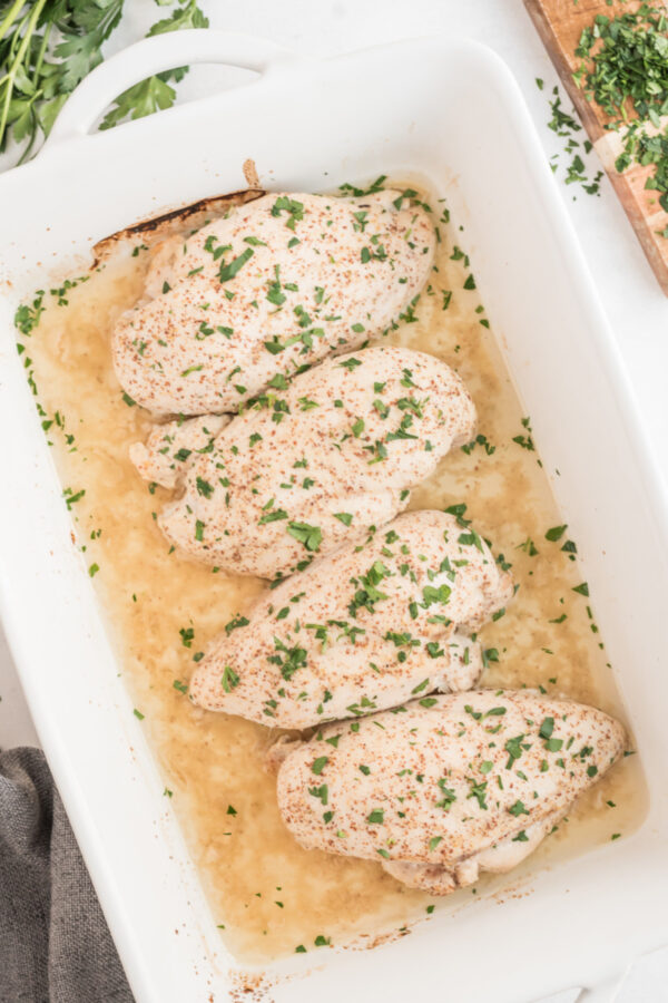 honey mustard chicken in white casserole dish