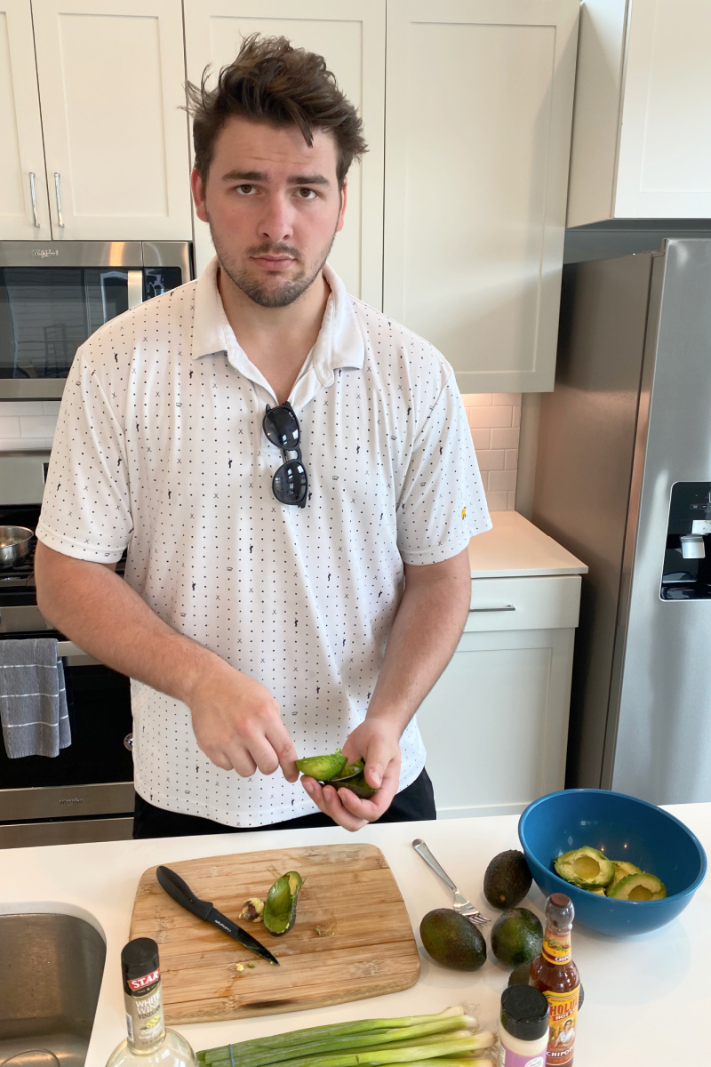 recipeboy cutting open avocados