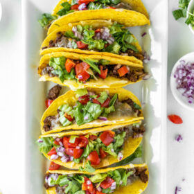 baked ground beef tacos on a platter