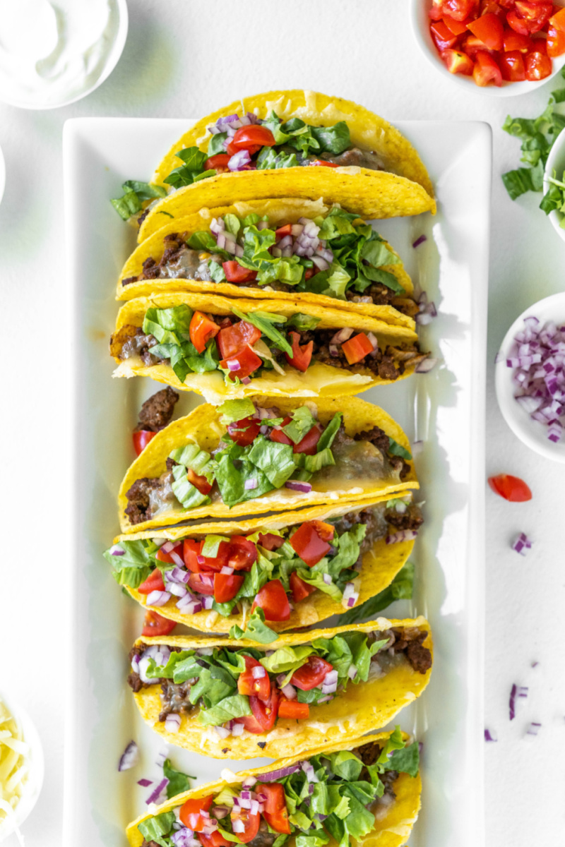 baked ground beef tacos on a platter