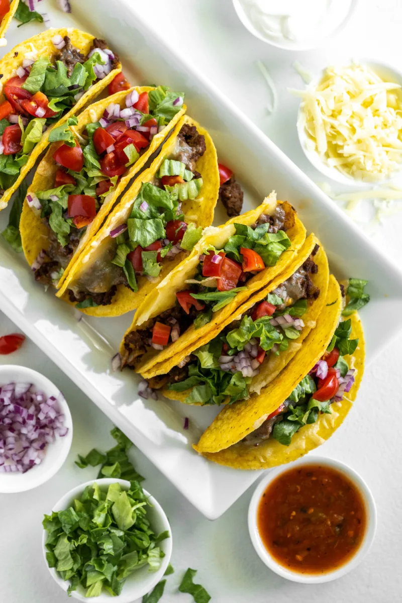 ground beef tacos on platter with fixings