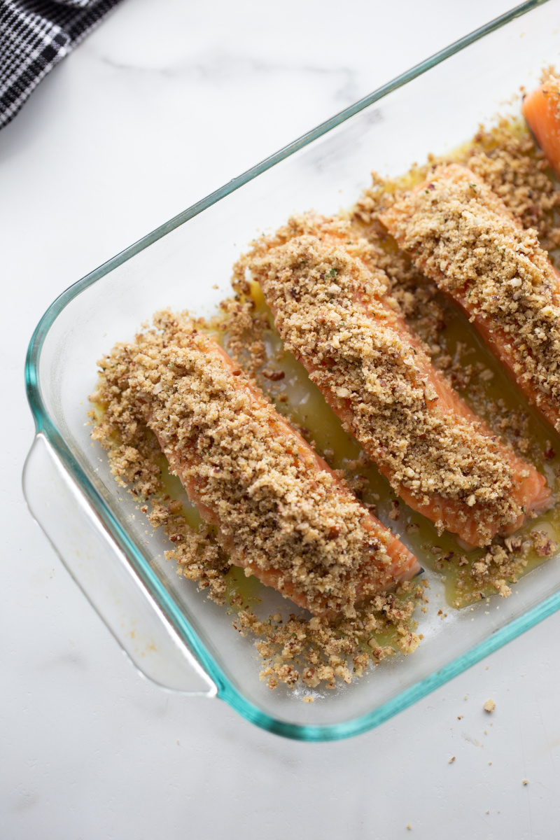 honey dijon and pecan baked salmon ready for oven in baking dish