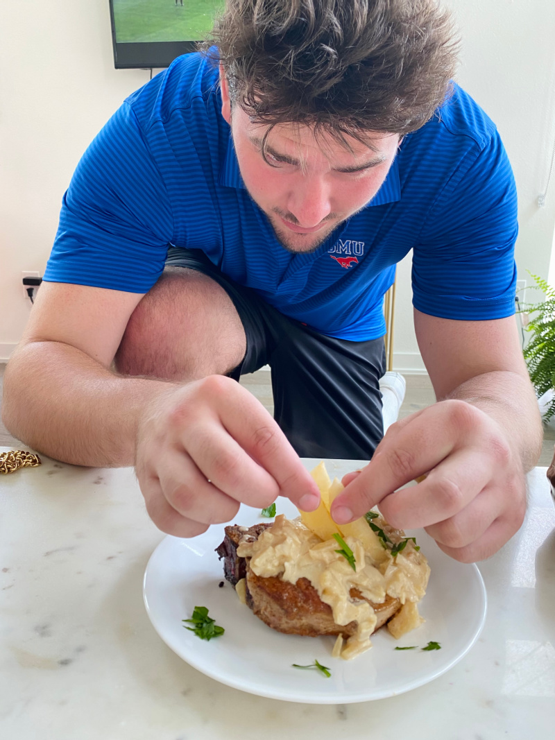 recipeboy garnishing pork chop dish