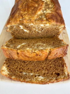 loaf of pumpkin cheesecake bread sliced