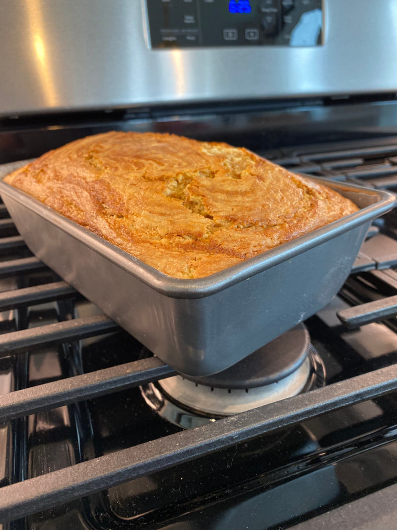 pumpkin bread in pan just out of oven