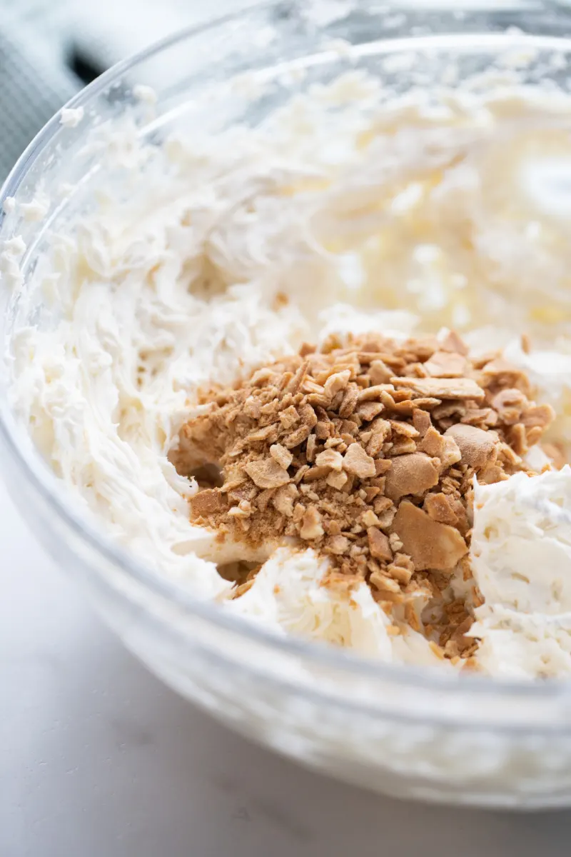 white frosting in bowl