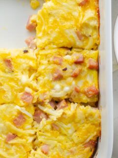 easy breakfast casserole in a dish cut into pieces