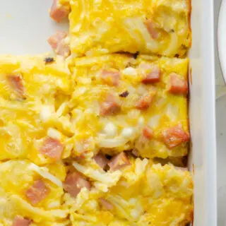easy breakfast casserole in a dish cut into pieces
