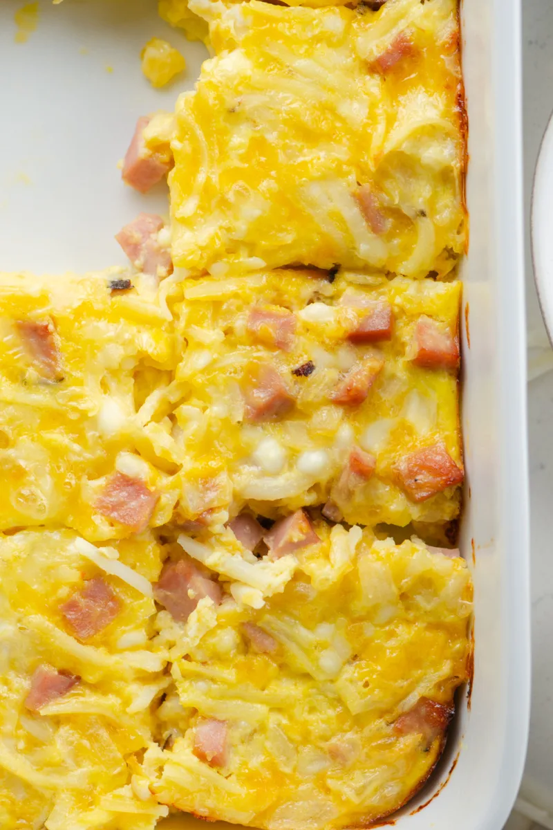 easy breakfast casserole in a dish cut into pieces