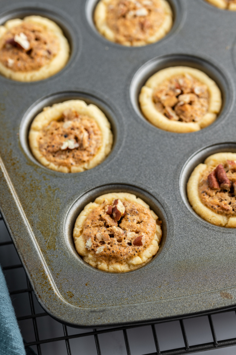 pecan tassies in a baking pan