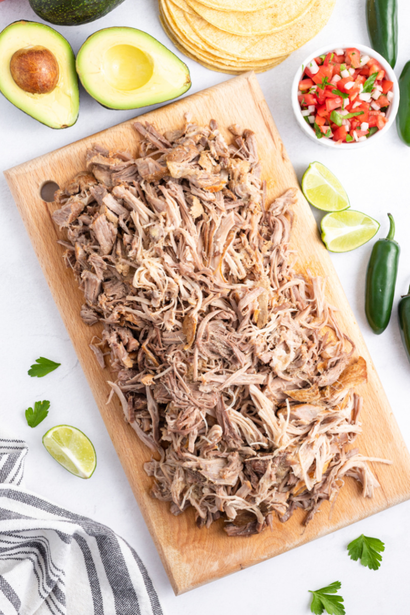 shredded carnitas on a board