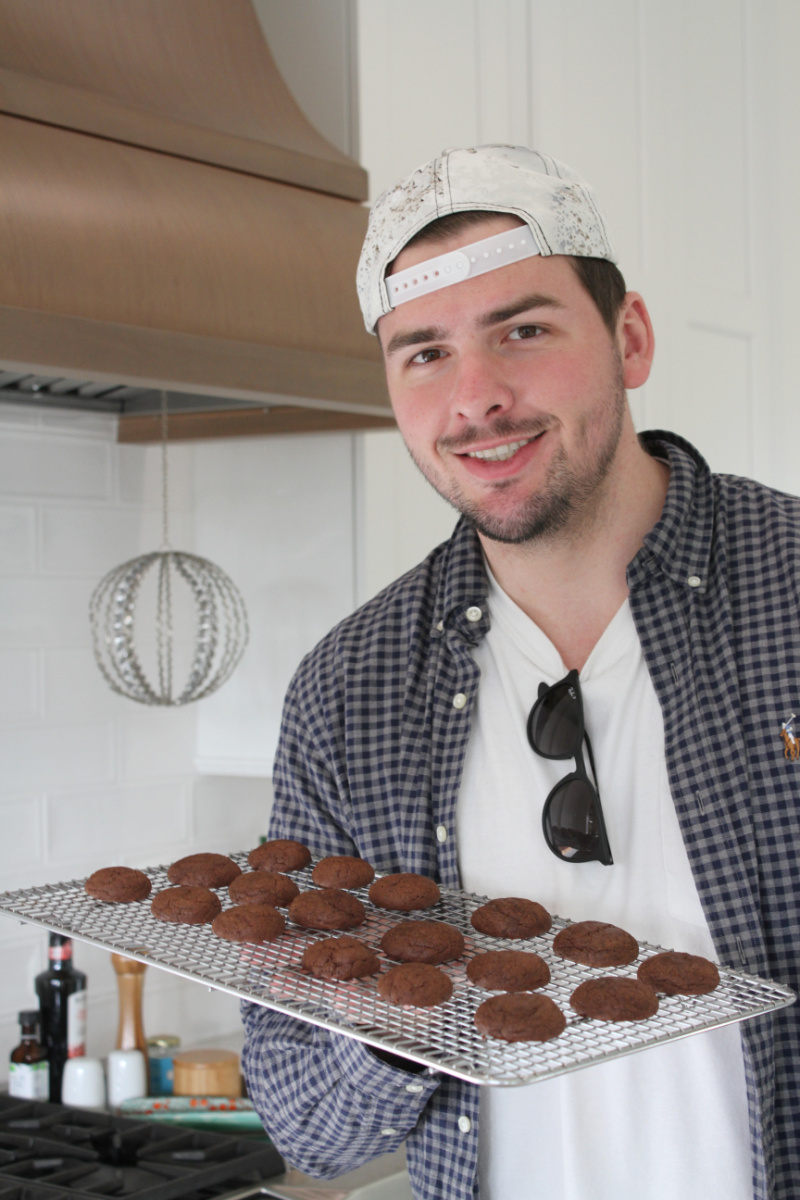 recipeboy holding platter of cookies