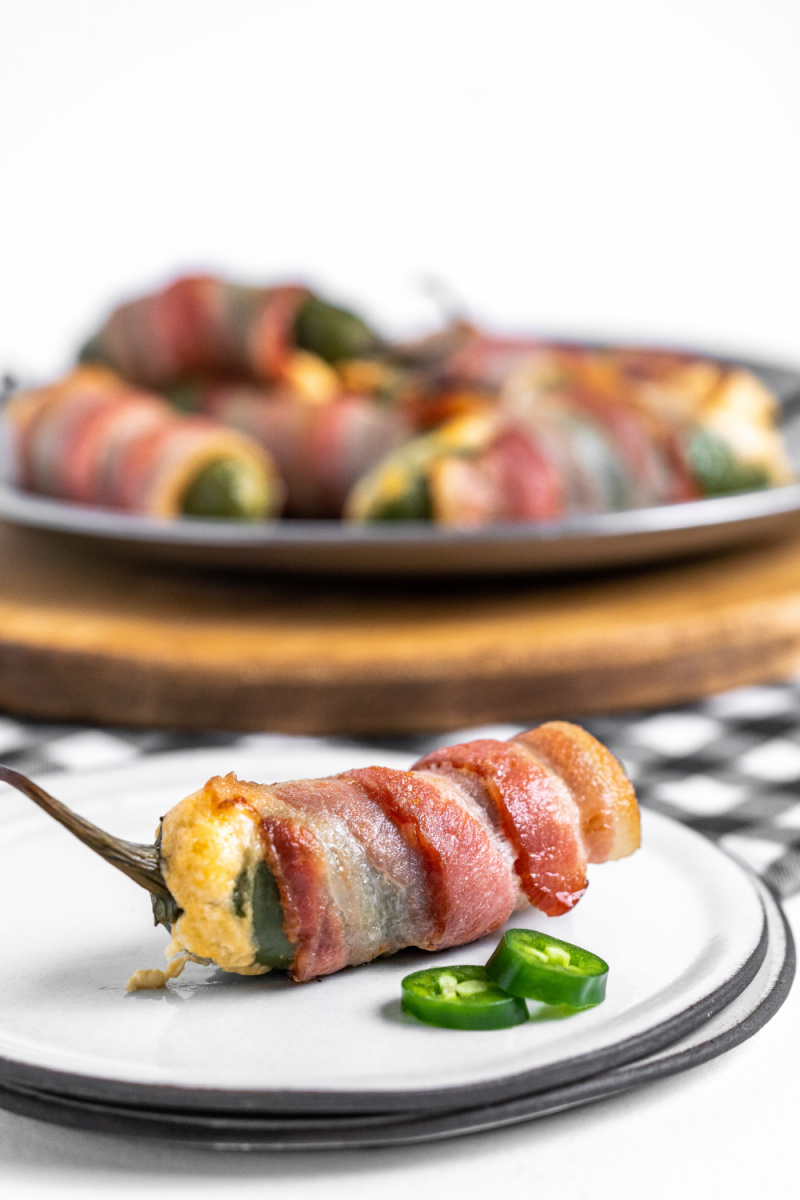 bacon wrapped jalapeno popper on plate