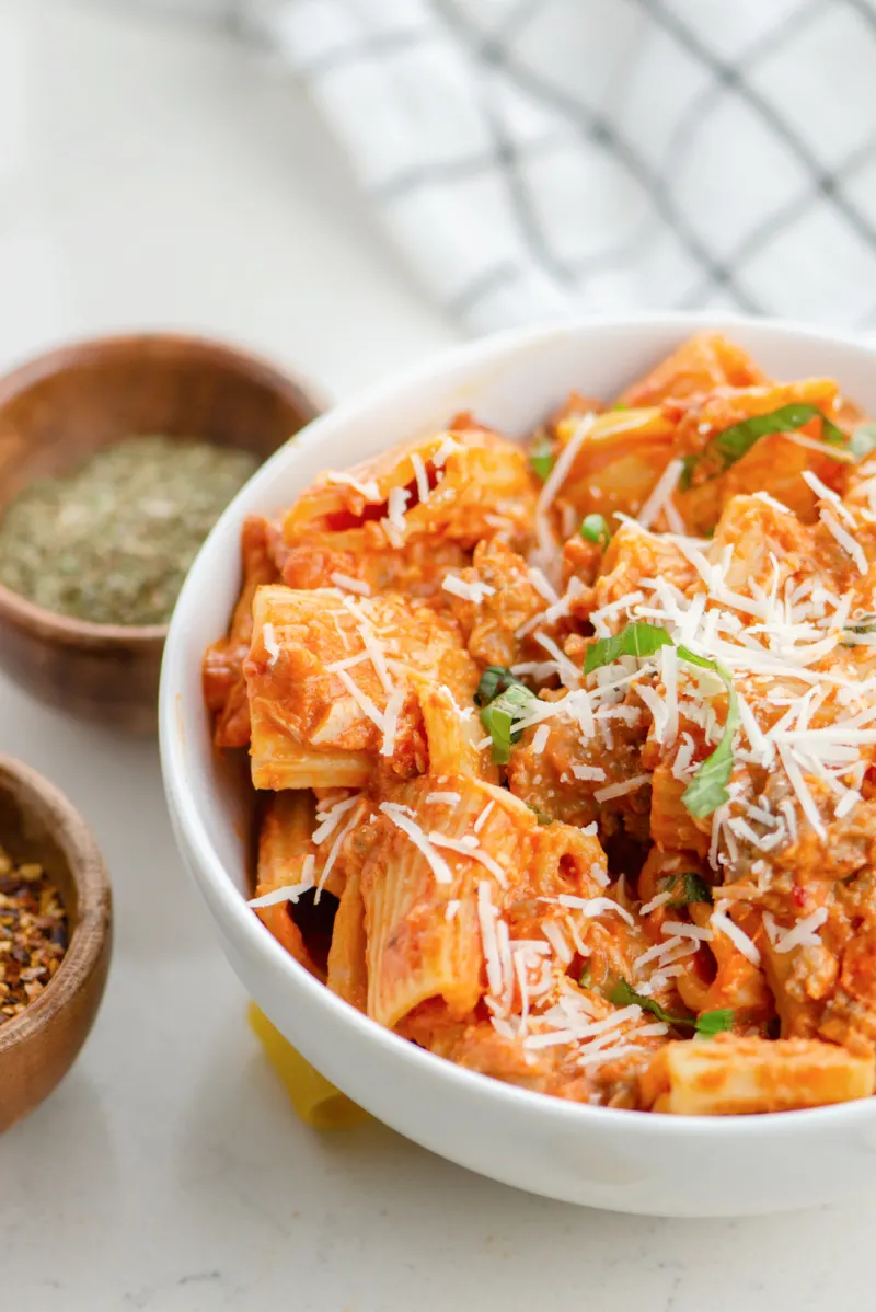 creamy tomato sausage rigatoni in a bowl