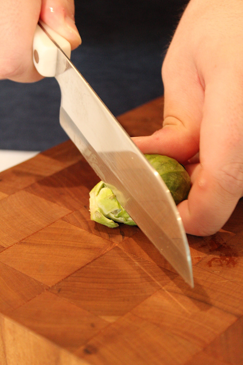 trimming brussels sprouts with knife