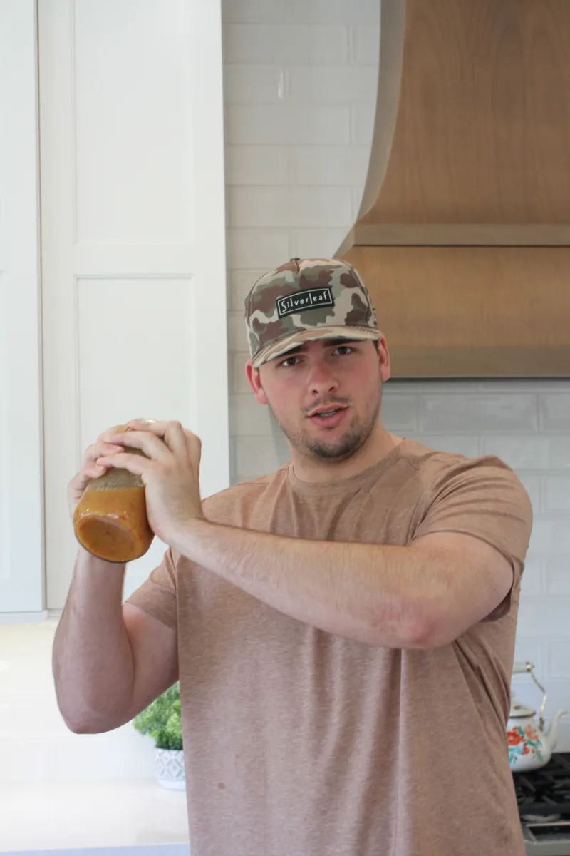 recipeboy shaking jar of salad dressing