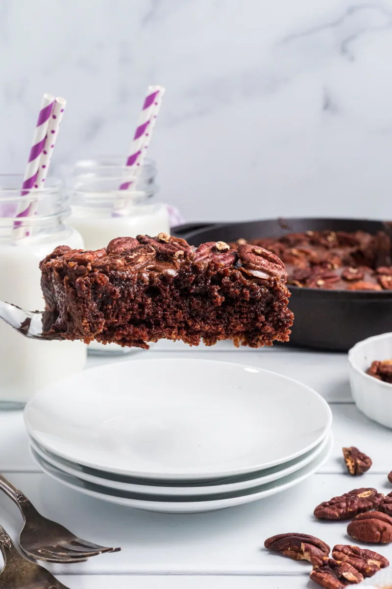 spatula taking out slice of texas skillet cake