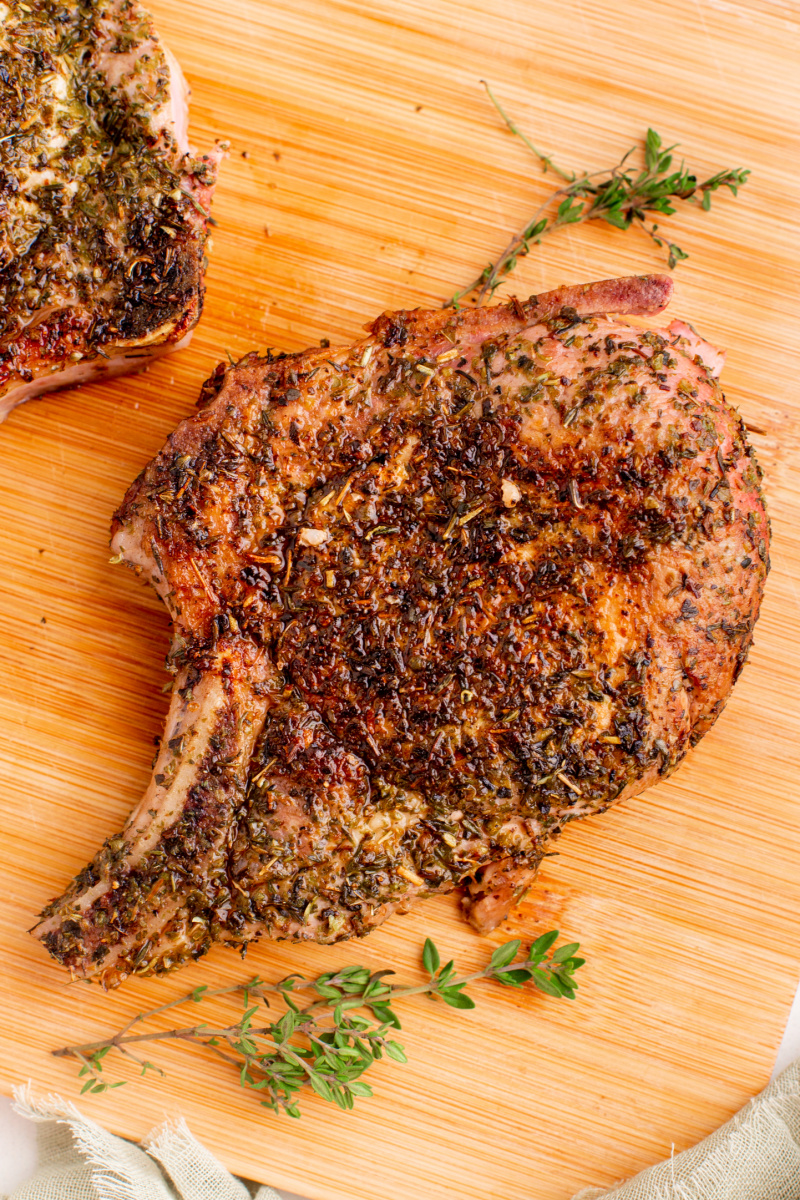 juicy skillet pork chop on cutting board