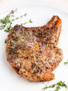 juicy skillet pork chop with fresh thyme