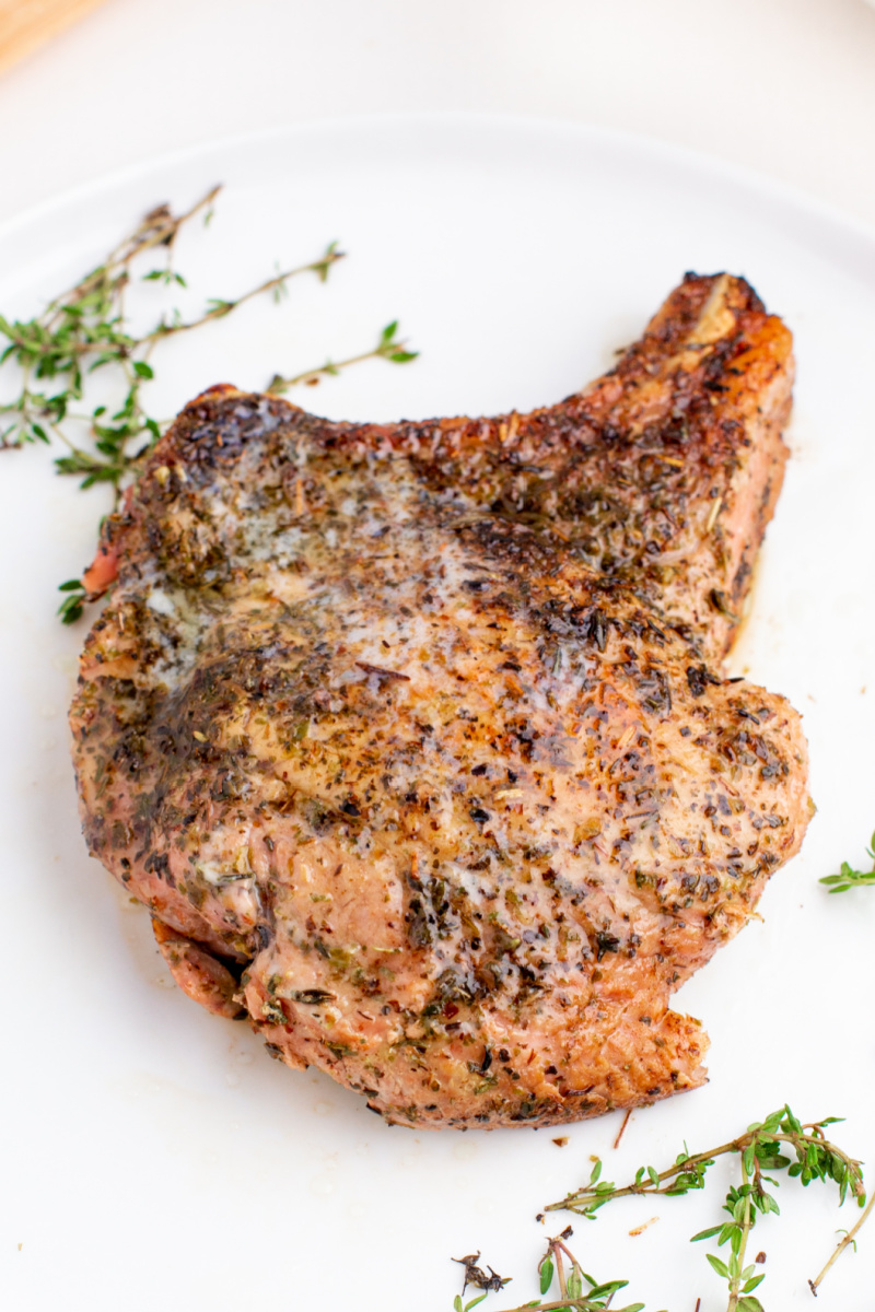 juicy skillet pork chop with fresh thyme