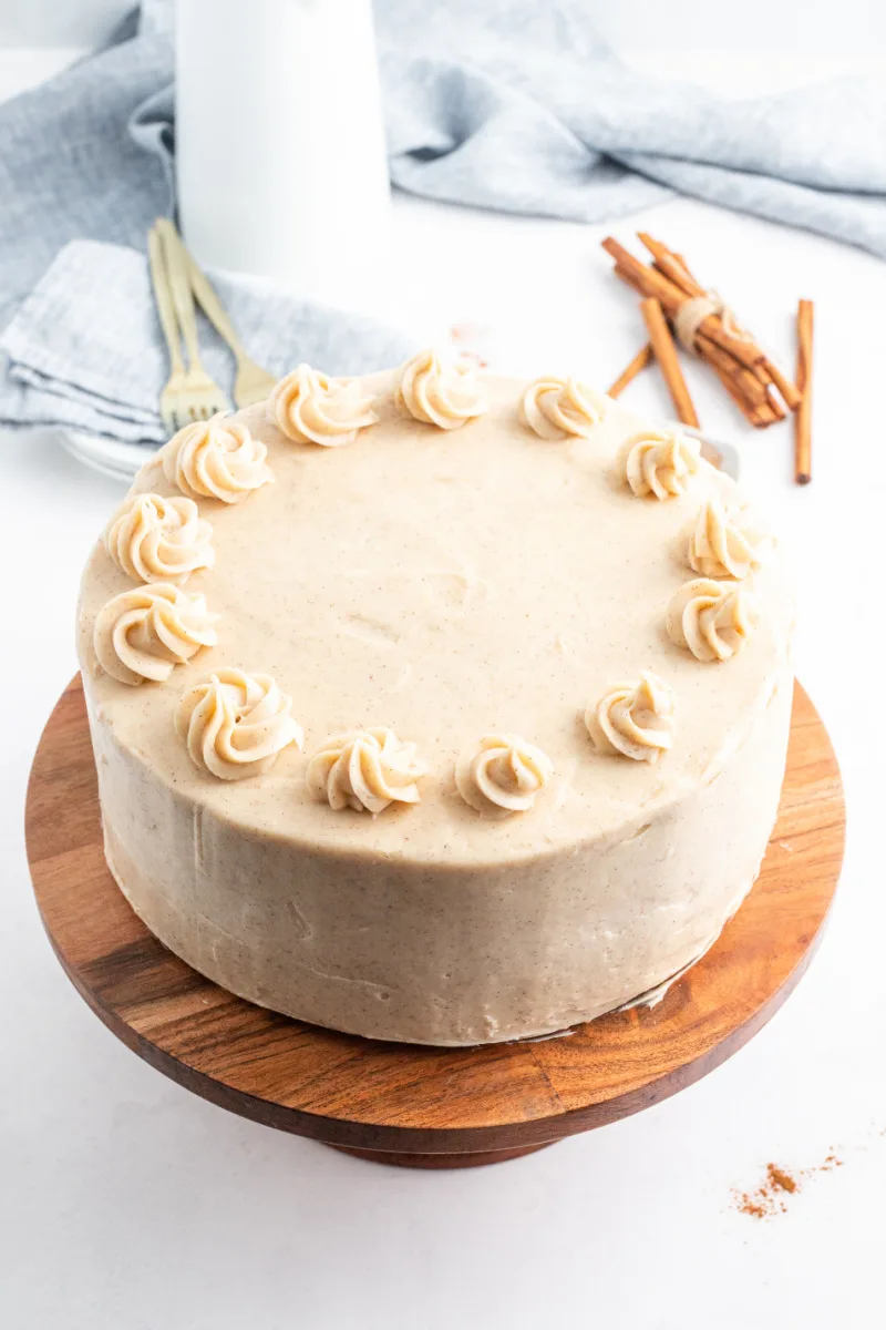 snickerdoodle cheesecake cake on platter