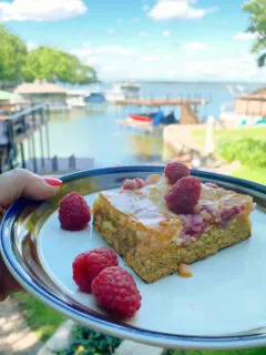 slice of raspberry gooey butter cake on a plate