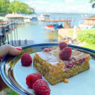 slice of raspberry gooey butter cake on a plate