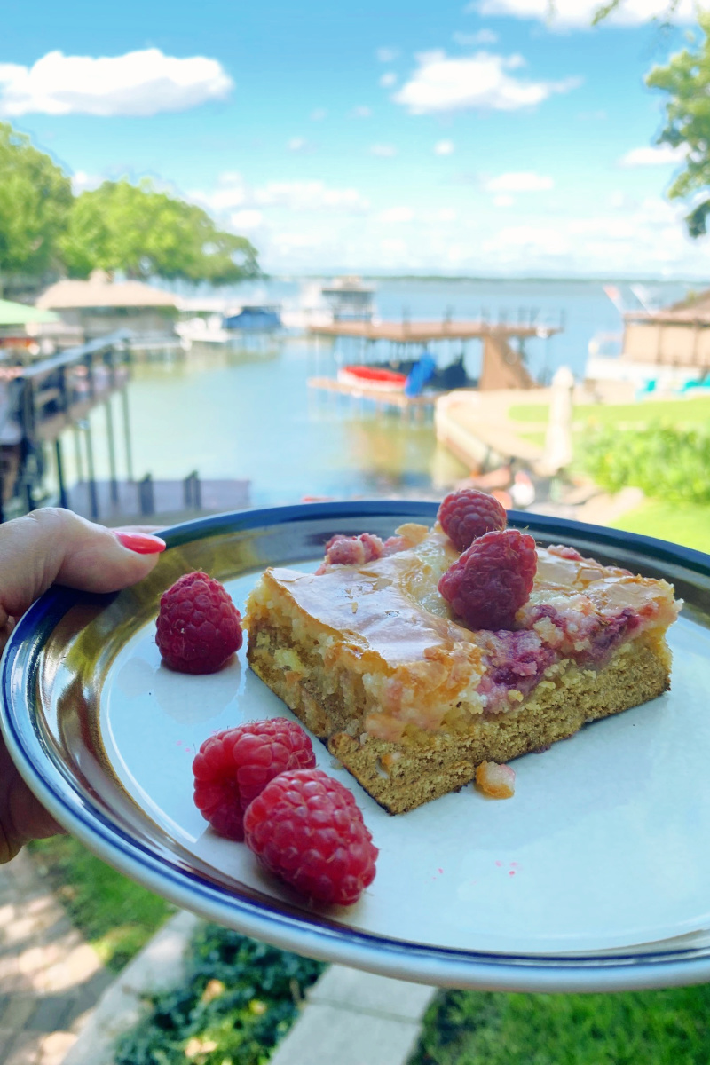 slice of raspberry gooey butter cake on a plate