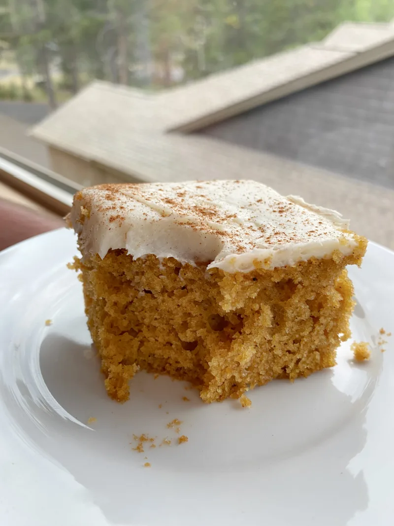 bite taken out of pumpkin cake on plate