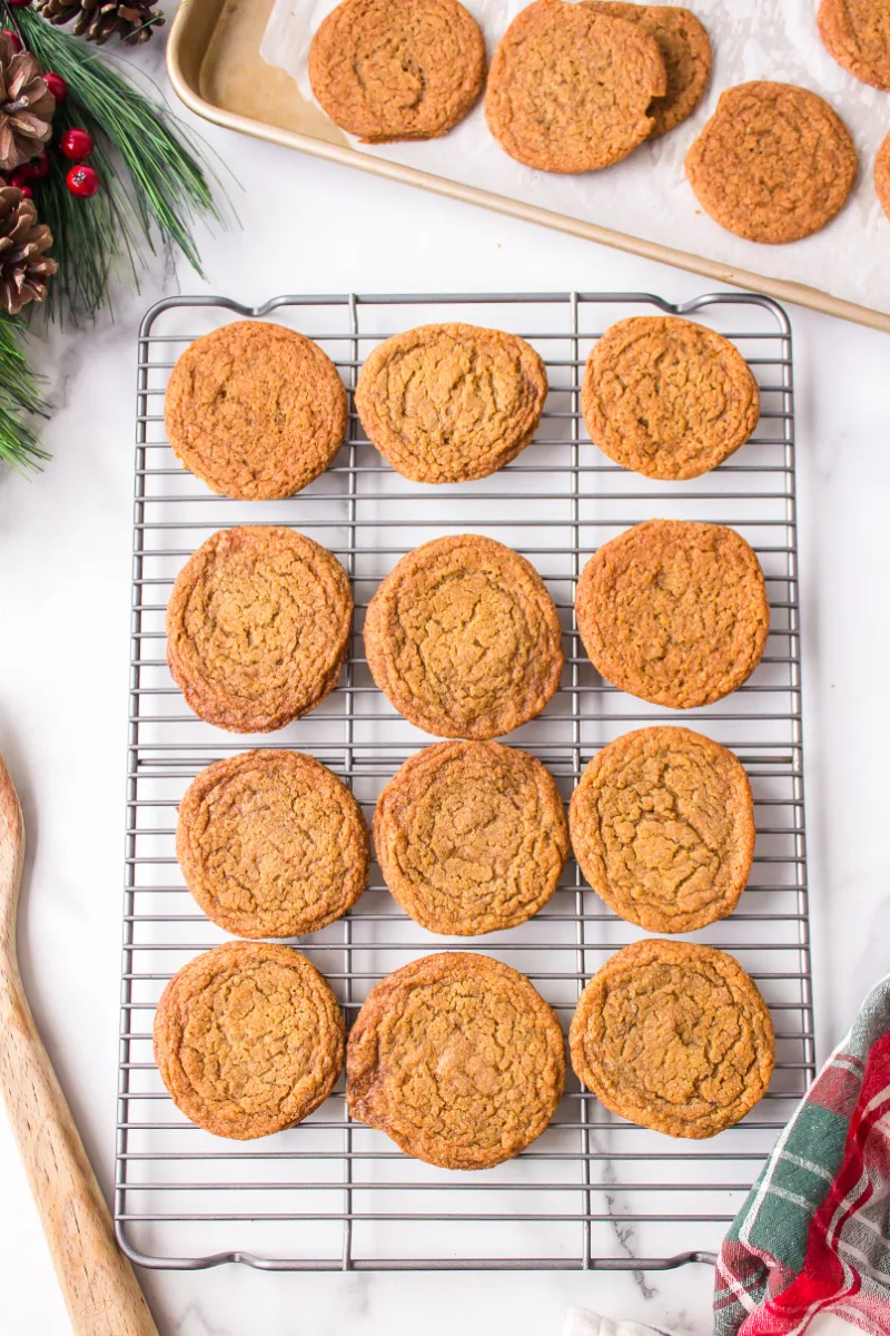 chewy gingerbread cookies on a baking rack