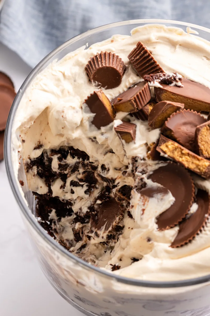 peanut butter cup brownie trifle with scoop taken out of it