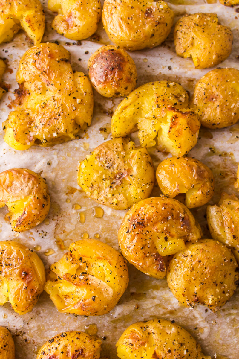 smashed potatoes on a baking sheet