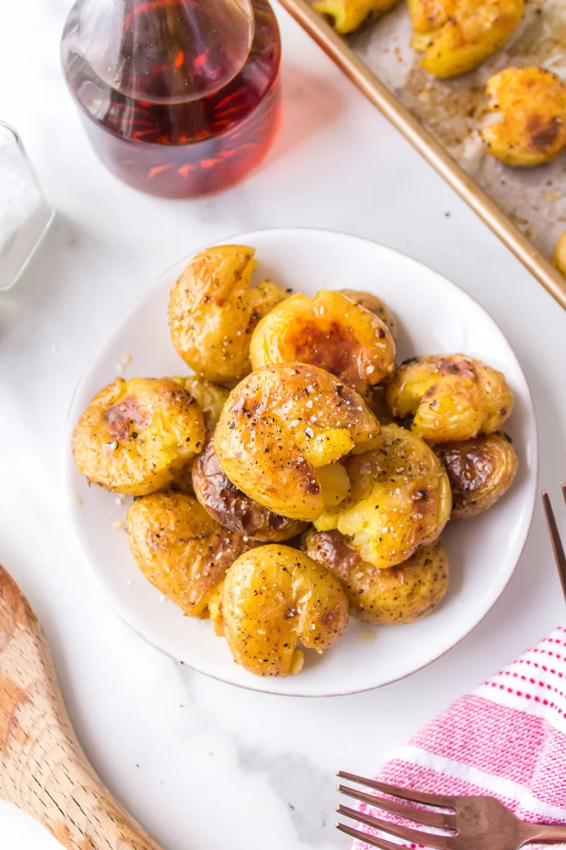 serving of salt and vinegar smashed potatoes on a plate