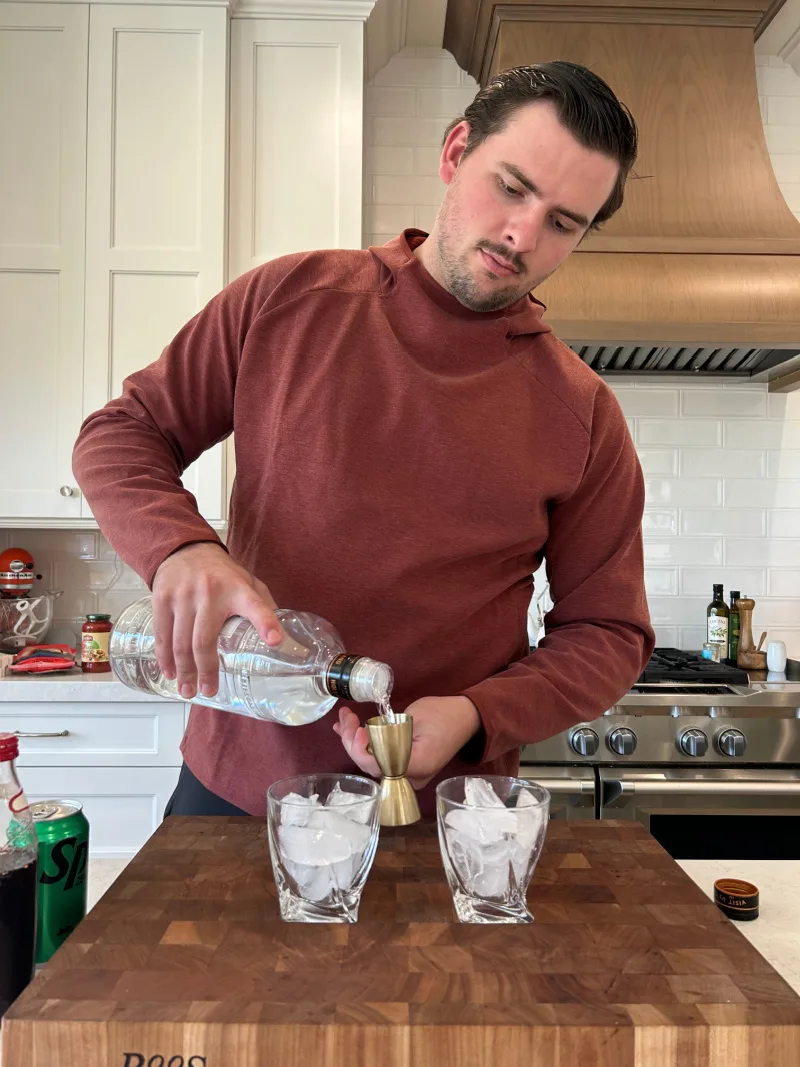 recipeboy pouring vodka into a glass