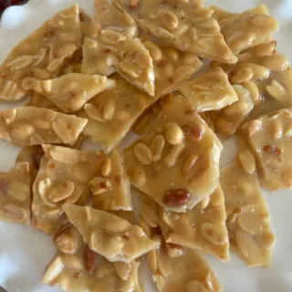 easy microwave peanut brittle on a platter