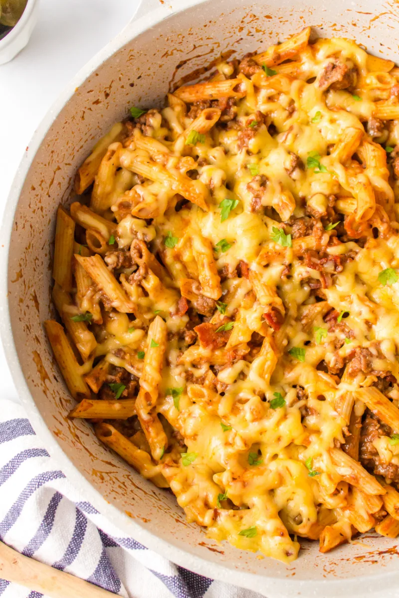 bacon cheeseburger pasta in a skillet