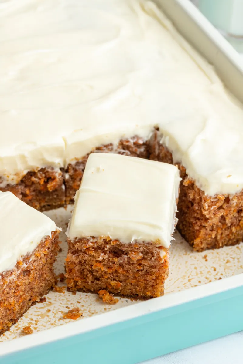 great grandma's carrot cake in pan with a couple slices cut out