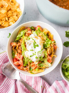 southwest frito pie serving in bowl with toppings