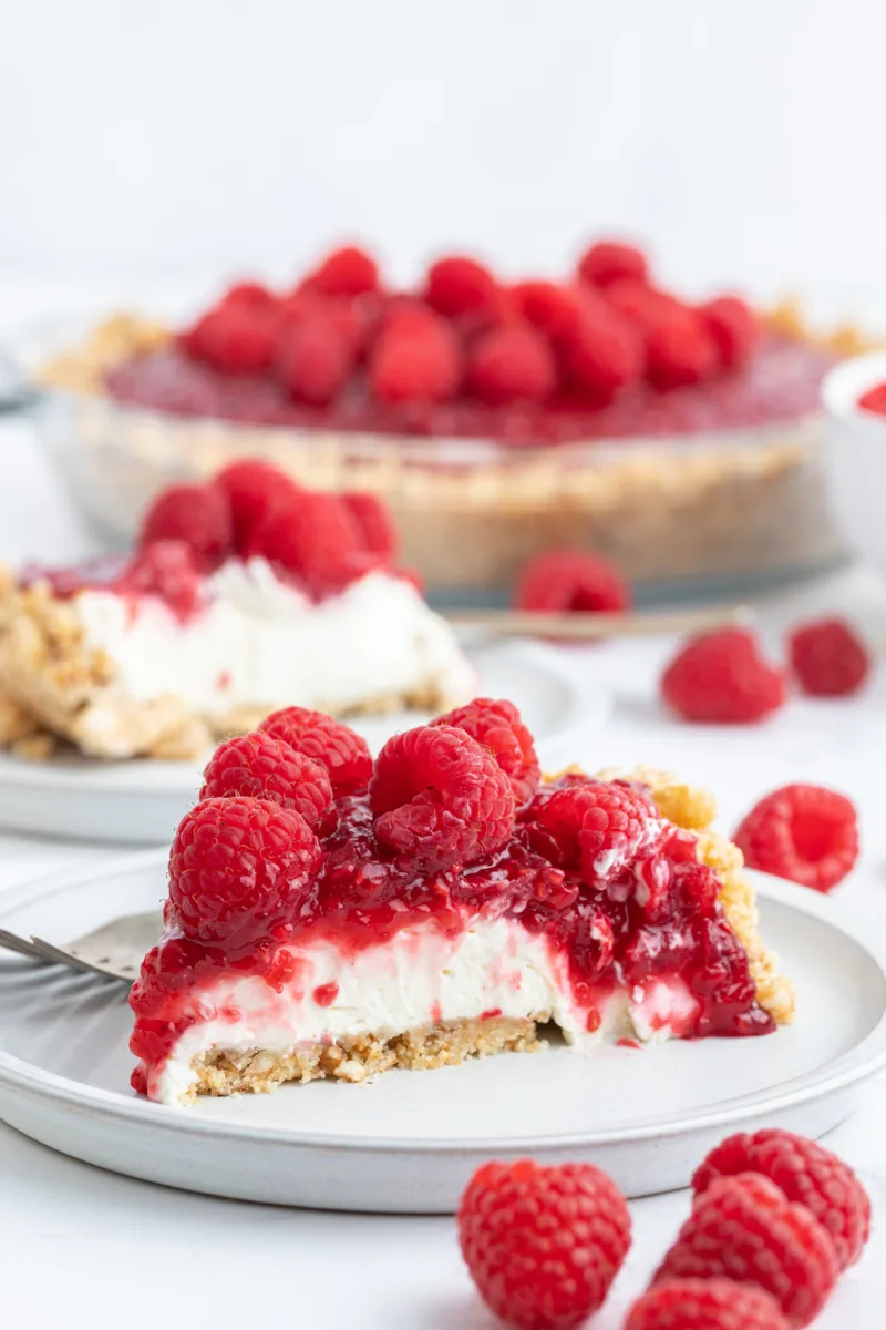 slice of raspberry cream pie on plate